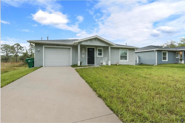 ranch-style house with a front yard and a garage