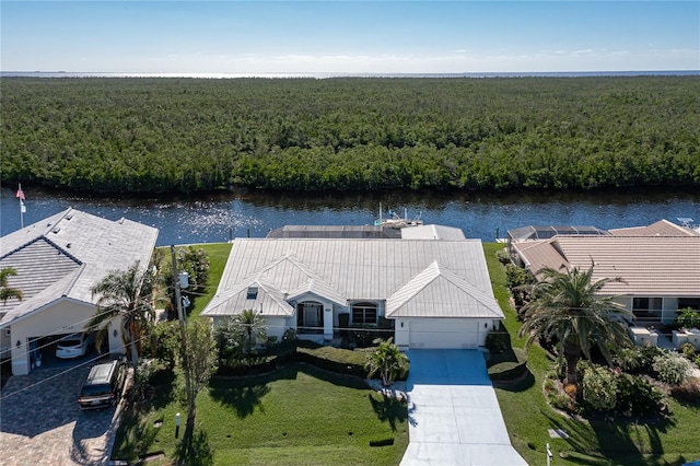 birds eye view of property featuring a water view