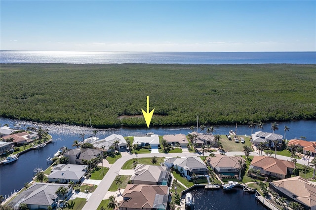 drone / aerial view featuring a water view