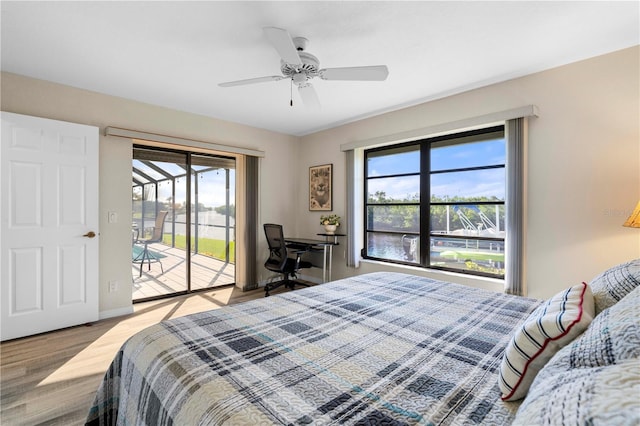 bedroom with access to outside, ceiling fan, and light hardwood / wood-style floors