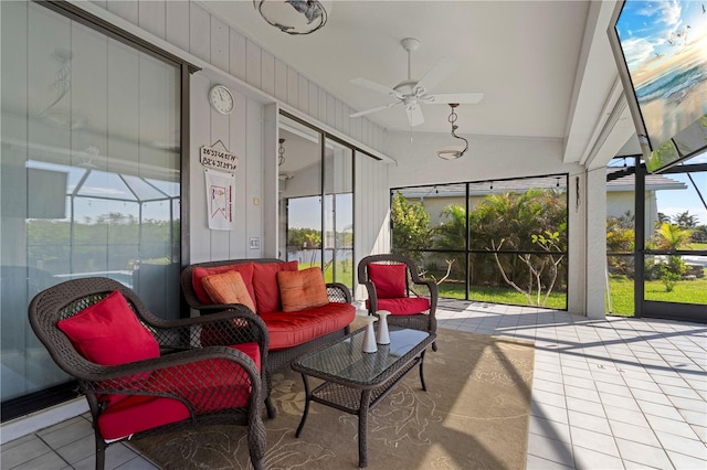 sunroom with vaulted ceiling and ceiling fan