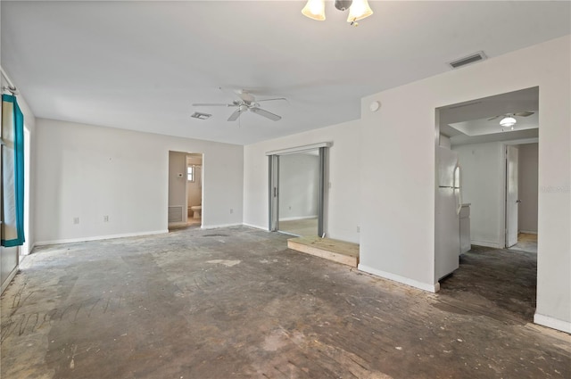 unfurnished room with ceiling fan