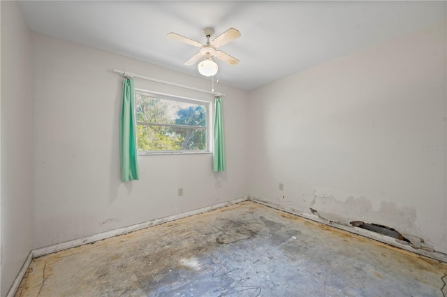 spare room with ceiling fan