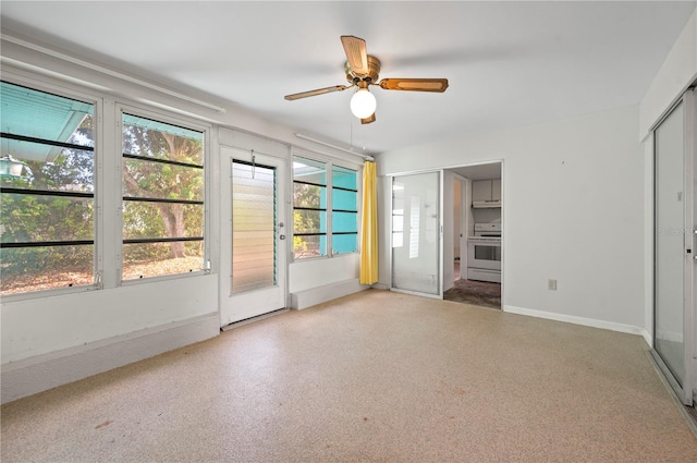 interior space featuring ceiling fan