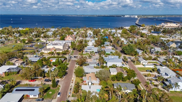 birds eye view of property featuring a water view