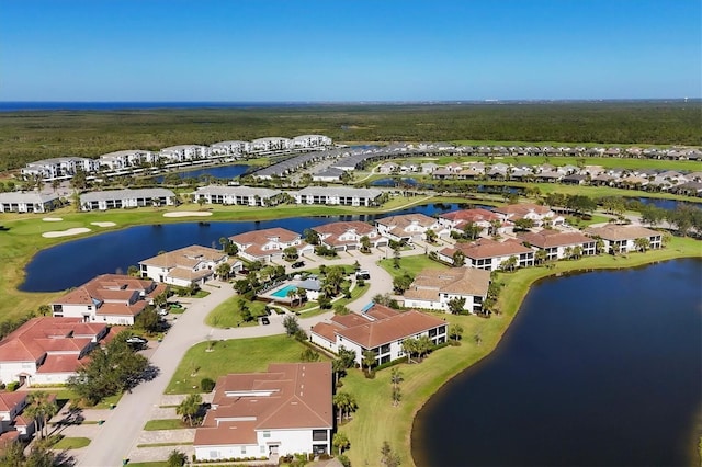 drone / aerial view with a water view