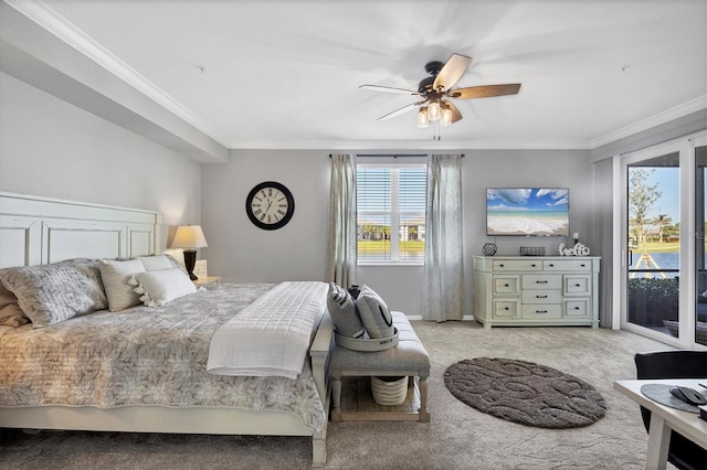 bedroom with multiple windows, ceiling fan, light colored carpet, and ornamental molding