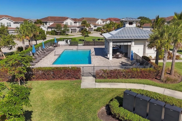 view of swimming pool featuring a gazebo, a yard, and a patio