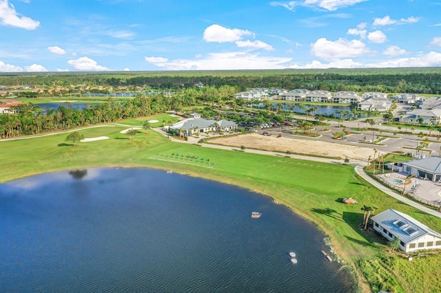 drone / aerial view with a water view