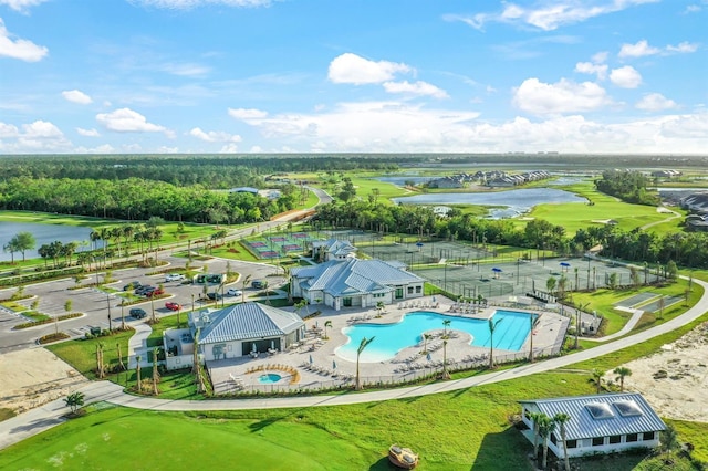 birds eye view of property featuring a water view