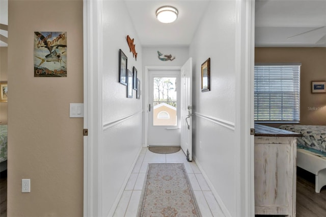 entryway with light tile patterned floors