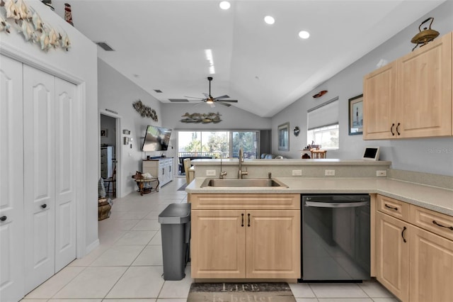 kitchen featuring ceiling fan, sink, light brown cabinets, dishwasher, and lofted ceiling