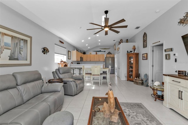 tiled living room featuring high vaulted ceiling and ceiling fan