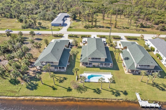 drone / aerial view with a water view