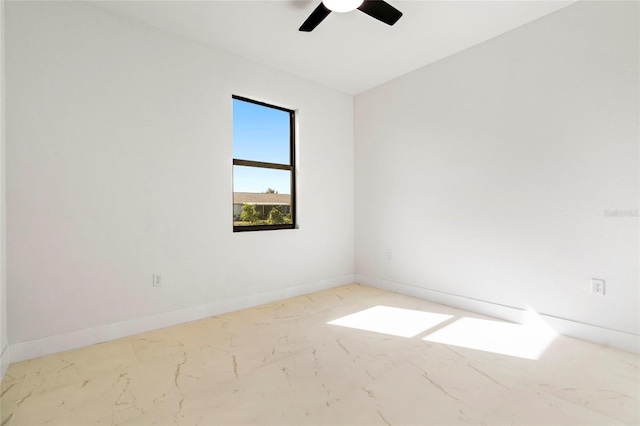 spare room with ceiling fan