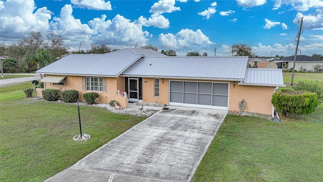 single story home featuring a front yard and a garage