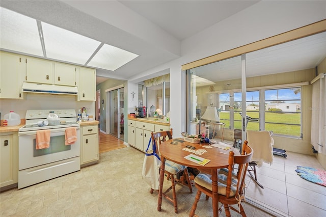 kitchen featuring white electric stove