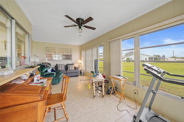 sunroom / solarium with ceiling fan and plenty of natural light