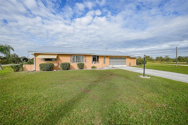 ranch-style home with a garage and a front yard