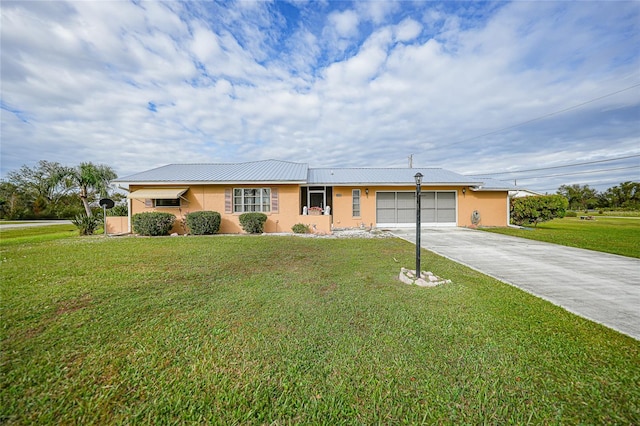 ranch-style house with a garage and a front lawn