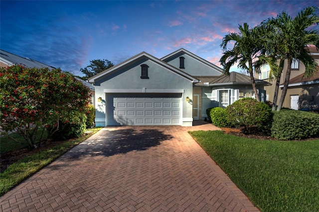 view of front of home with a garage