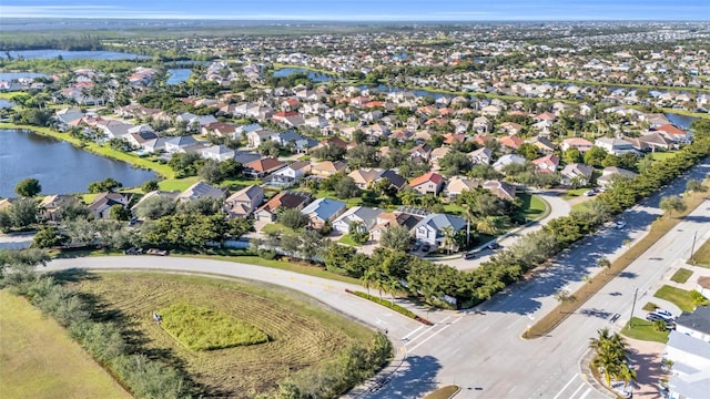 drone / aerial view with a water view