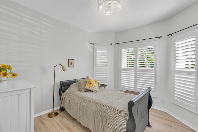 bedroom featuring light hardwood / wood-style floors