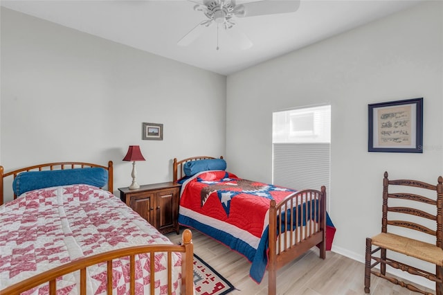 bedroom featuring ceiling fan and light wood-type flooring