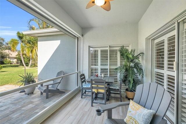 exterior space featuring ceiling fan