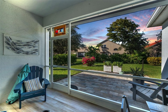 doorway to outside with hardwood / wood-style flooring