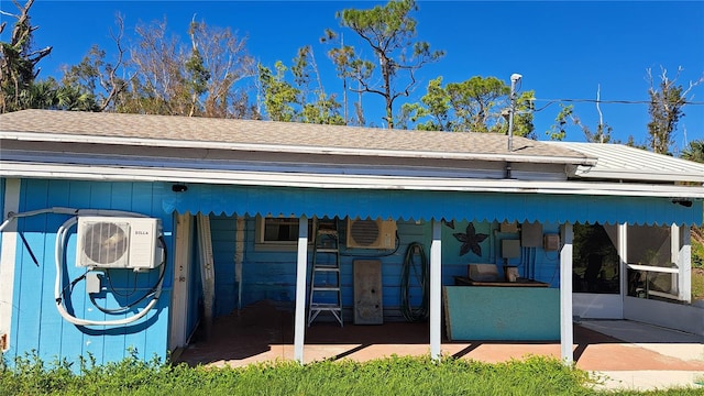 exterior space with ac unit