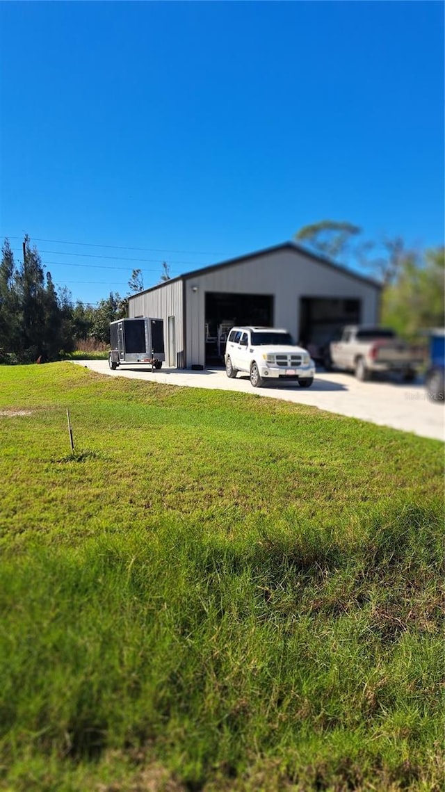 view of yard featuring a garage