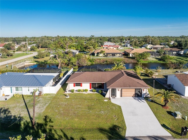 drone / aerial view with a water view