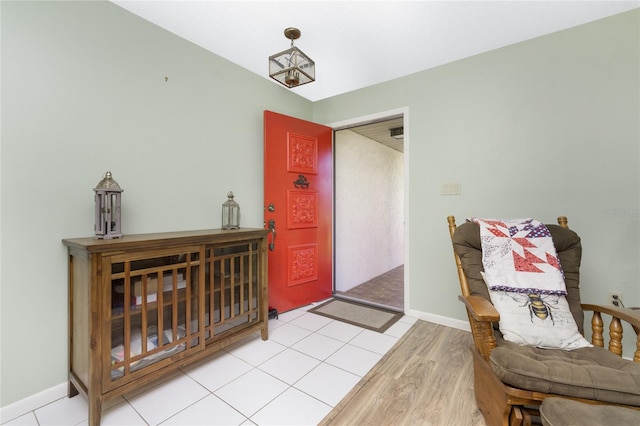 foyer entrance featuring wood-type flooring