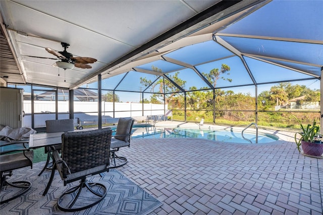 view of patio / terrace featuring a fenced in pool, ceiling fan, and a lanai