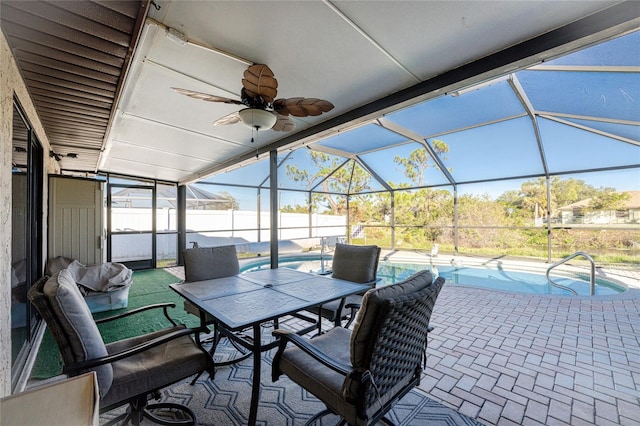 view of patio / terrace featuring ceiling fan, a lanai, and a fenced in pool