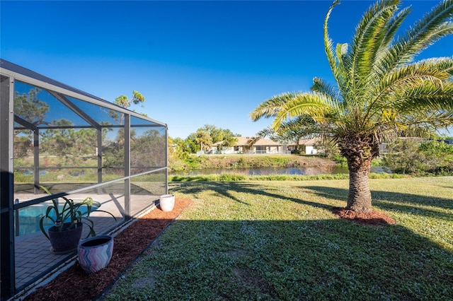 view of yard with a lanai