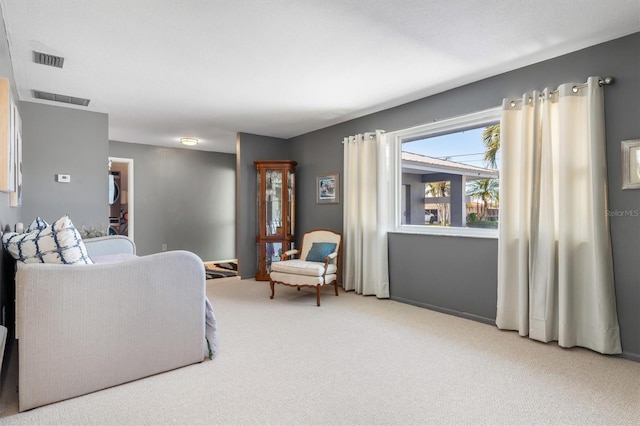 living room featuring light carpet