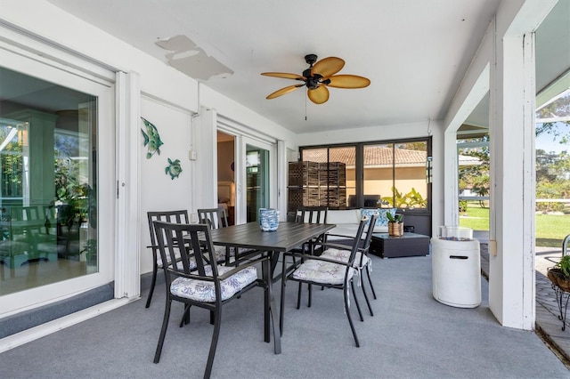 sunroom / solarium with ceiling fan