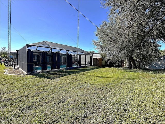 view of yard featuring a lanai