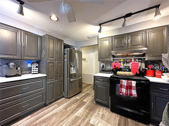 kitchen with tasteful backsplash, black range with electric stovetop, light hardwood / wood-style floors, and stainless steel refrigerator with ice dispenser