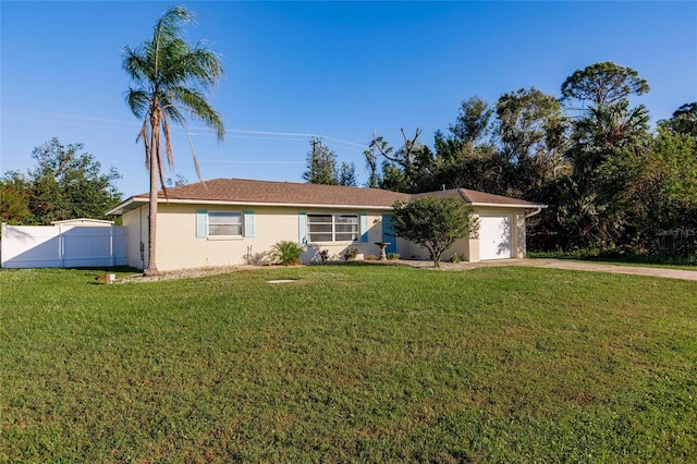 single story home featuring a front yard and a garage