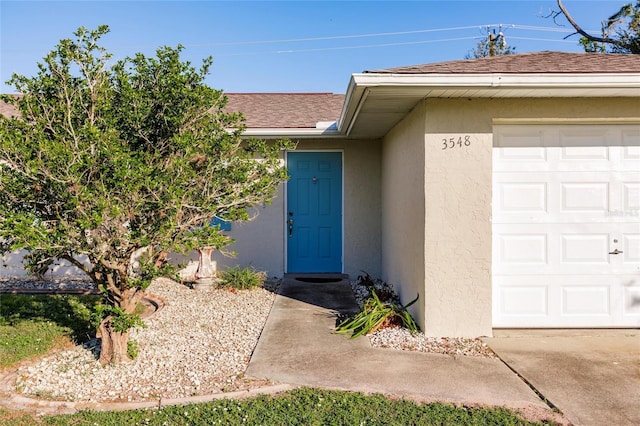 property entrance featuring a garage