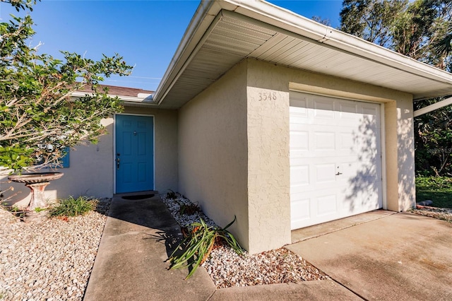 property entrance featuring a garage