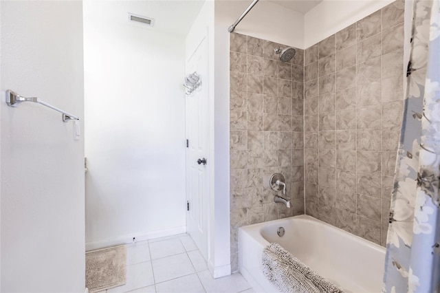 bathroom with shower / bath combo and tile patterned floors