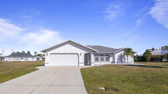 single story home with a front yard and a garage