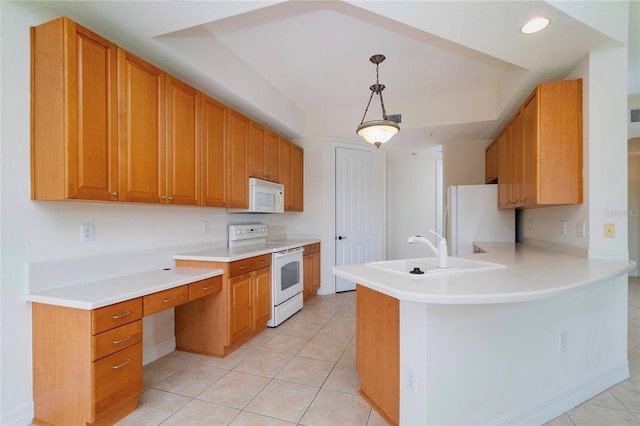 kitchen with white appliances, sink, light tile patterned floors, decorative light fixtures, and kitchen peninsula