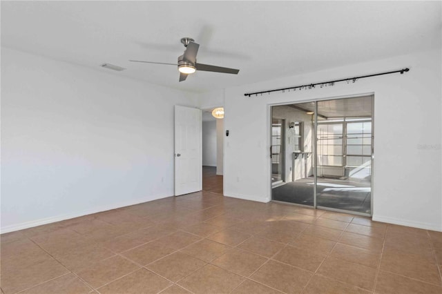 spare room featuring ceiling fan