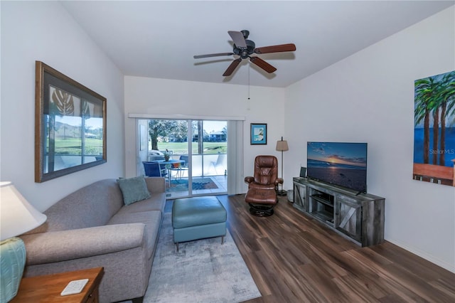 living room featuring wood-type flooring and ceiling fan