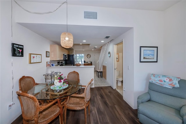 dining room featuring dark hardwood / wood-style floors